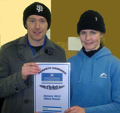 Alison Brown receives her certificate 
from David Swinburne