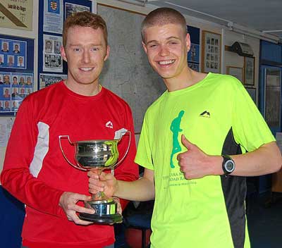 Sam Hancox (Right) receiving his trophy from David Swinburne